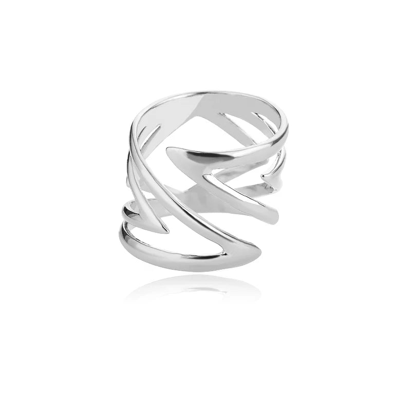 “Sculpted Wave Statement Ring”